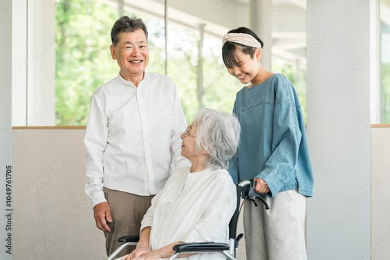 車椅子で受診している様子